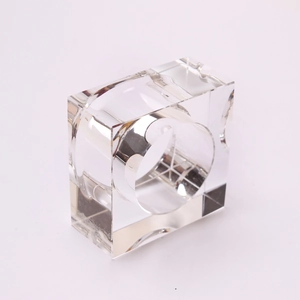 Macro shot of square clear crystal napkin ring with smooth polished edges for table decor
