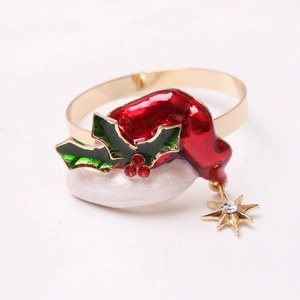 Christmas napkin ring with red enamel Santa hat and golden star pendant for dining table