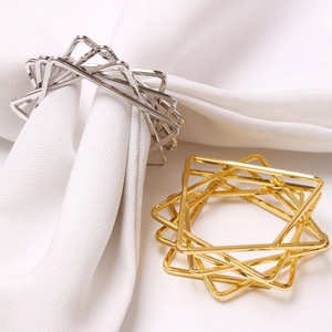Modern geometric star napkin rings in gold and silver finish with square frames