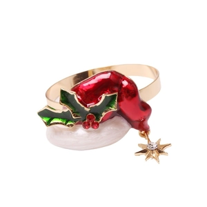 Christmas elf hat napkin ring with red enamel and golden star pendant for holiday tables