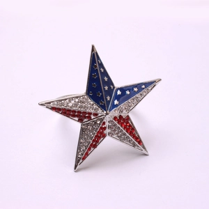 Detalle de servilletero estrella bandera USA con esmalte azul y cristales