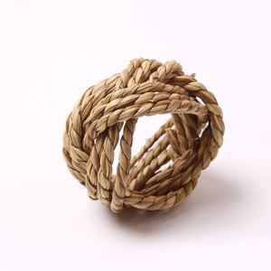 Detailed macro view of handcrafted woven bamboo and corn husk fiber napkin ring