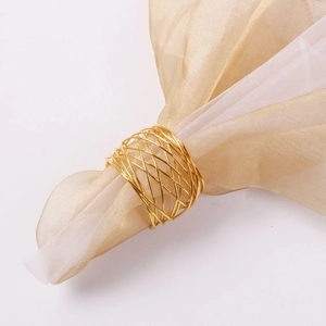 Elegant champagne gold wire mesh napkin ring with a woven diamond lattice design