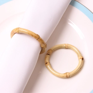 Natural bamboo style napkin rings set of 2 on white plate for elegant dining table decor