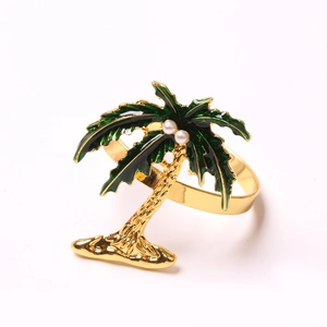 Tropical coconut tree napkin ring in gold finish with green enamel and white pearls