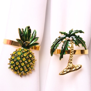 Tropical pineapple and coconut tree napkin rings with yellow rhinestones and green enamel
