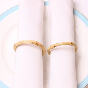 Natural round bamboo napkin rings set of 2 with authentic wood texture and varnish finish