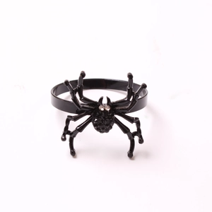 Black spider napkin ring with textured body and white crystal eyes for Halloween decor