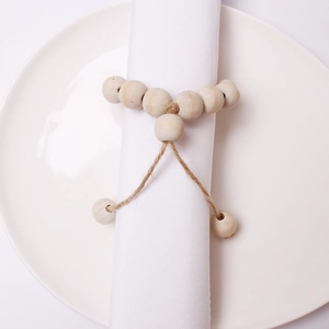 Natural wooden bead napkin ring with jute rope for rustic Christmas table decoration
