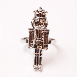 Polished silver metal nutcracker soldier napkin ring for festive table decoration