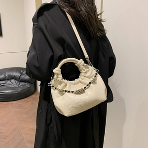 Chic pleated cloud bag in off-white faux leather with beaded chain and round handle