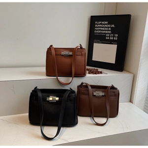 Detailed comparison of three colors in textured pebble leather bags with silver clasps