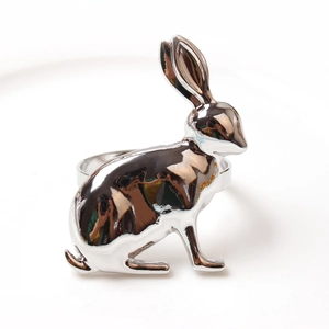 Elegant silver rabbit napkin ring with a polished chrome finish for festive table decor
