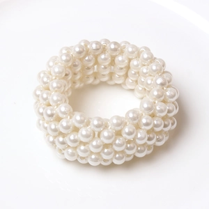 Elegant white pearl woven napkin ring for wedding decor and table settings