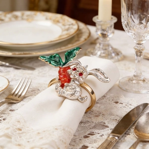Easter bunny and carrot napkin ring on white cloth for elegant dining table decor