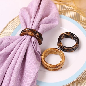 Brown bamboo napkin rings with natural wood texture for elegant table decoration