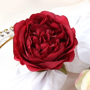 Modern burgundy faux peony napkin ring with silk petals for elegant wedding table decor