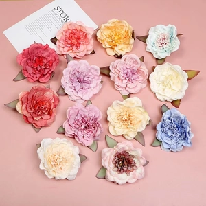 Faux peony napkin rings in vintage Morandi colors with silk petals and green leaf accents
