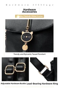 Detail of litchi grain leather backpack with golden cat charm and adjustable buckles