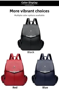 Detailed view of soft leather backpacks in black, red, and blue with metal logo accents