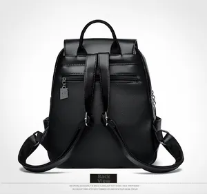 Detail view of black lychee leather backpack with anti-theft back zipper pocket
