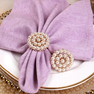 Elegant gold pearl napkin rings set of 2 for wedding tables and luxury dining decor
