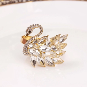 Elegant swan napkin ring with gold base, white crystals and marquise stones for decor