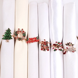 Set of 6 Christmas napkin rings featuring reindeer, tree, and bell with crystals
