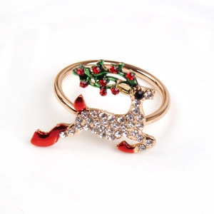Detailed view of Christmas reindeer napkin ring with white rhinestones and red enamel details