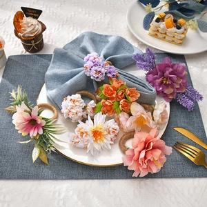 Artificial rose napkin rings with rustic hemp rope base in various floral colors