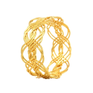 Minimalist woven gold napkin ring with luxury braided texture for elegant table decor