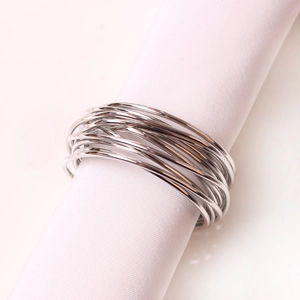 Silver metal wire layered napkin ring with creative multi-loop design shown at 45 degrees
