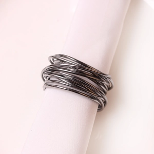 Artistic multi-layer wire coil napkin ring in dark gunmetal plated metal finish