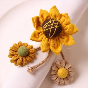 Handcrafted sunflower and daisy fabric napkin ring with rustic jute rope tie-on detail