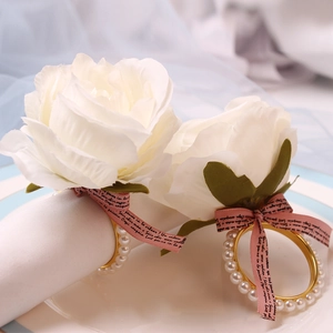 Elegant white rose napkin rings with pink ribbon bows and pearl gold bands set of 2