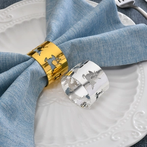 Elegant gold and silver reindeer napkin rings set for festive Christmas table decor