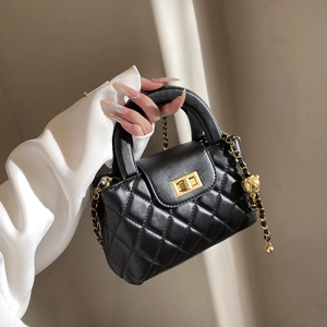 French style quilted chain bag in black leather with gold metal ball and turn-lock
