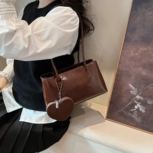 Vintage brown oil wax leather Boston bag with a small heart pendant for women