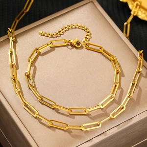 Luxury gold paperclip chain necklace and bracelet set for minimalist layering style