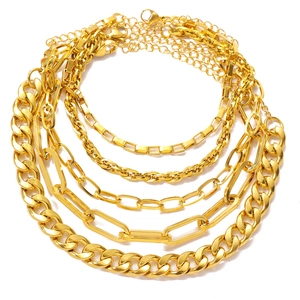 5-piece gold chain bracelet set with Cuban, paperclip, and box links on white background