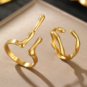 Modern irregular gold-plated liquid style rings set with fluid geometric open design