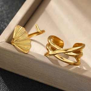 Detail of 18K gold plated leaf ring and multi-layer geometric adjustable bands
