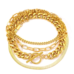 Layered gold stainless steel bracelet set with cuban, snake, and paperclip chains and toggle clasp