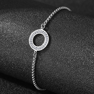 Detail of silver stainless steel box chain with micro-pave crystal hollow circle pendant