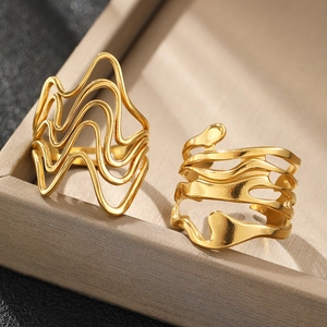 Irregular lava design hollow gold rings set with a polished minimalist aesthetic