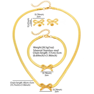 Detail of golden bow jewelry set including necklace and bracelet with dimensions