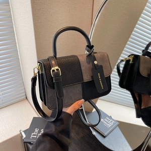 Fashionable black and grey colorblock crossbody bag with adjustable metallic strap