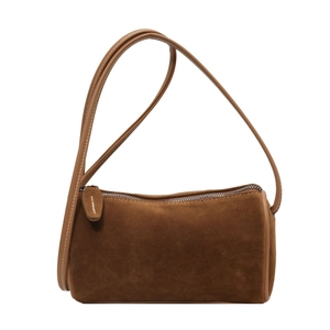 Deep brown suede Boston barrel crossbody bag with contrast stitching and leather strap