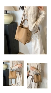 Litchi pattern leather bucket bag detail showing hand-carry and crossbody styling options