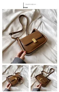 Detailed views of a brown crossbody bag with gold rotating lock on white fabric